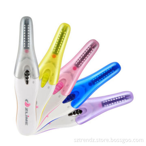 Portable electric eyelash curler, two level temperature, demountable eyelash comb & cosmetics